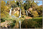 Falls Reflected In River