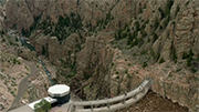 3 Visitors Walk On Buffalo Bill Dam