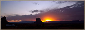 Sun's last light behind buttes